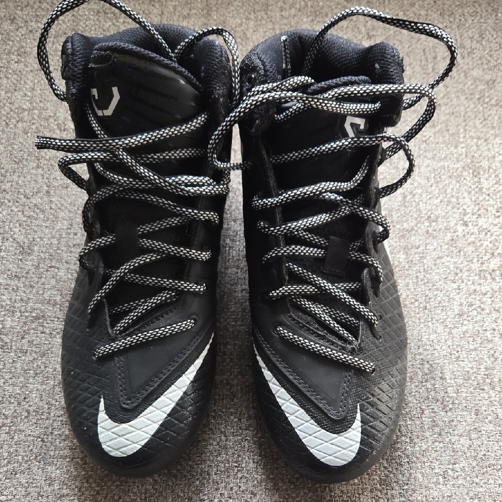 Black and White Nike Big Boys Cleats